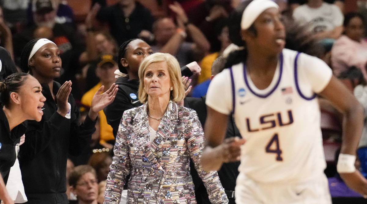 LSU coach Kim Mulkey walks on the sideline